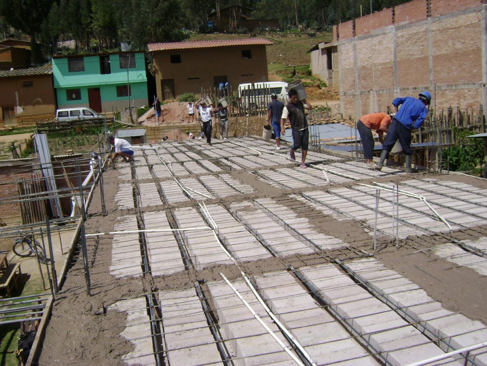 Pouring the cement for the ceiling of ground floor/floor of second story of the Church of God in Cajamarca, Peru. This building will serve the entire Cajamarca region for training church pastors, leaders, evangelists and church planters.